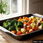 Home 23 로스팅 채소를 활용한 이색적인 조리 팁 - A vibrant, rustic kitchen scene featuring a large baking tray filled with evenly cut roasted vegetab...